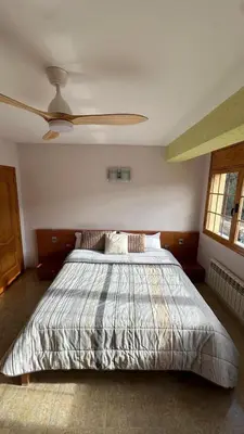 Cama o camas de una habitación en Ca la Cabrera