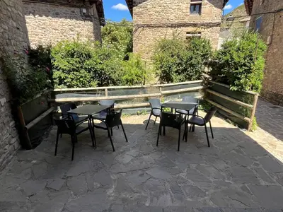 Un patio o zona al aire libre en Posada OsTablaus