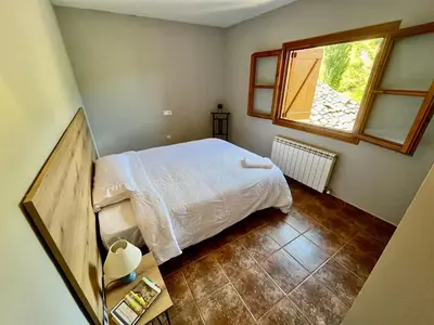Cama o camas de una habitación en Posada OsTablaus