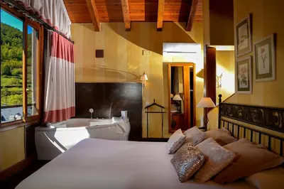 Cama o camas de una habitación en Hotel Pradas Ordesa