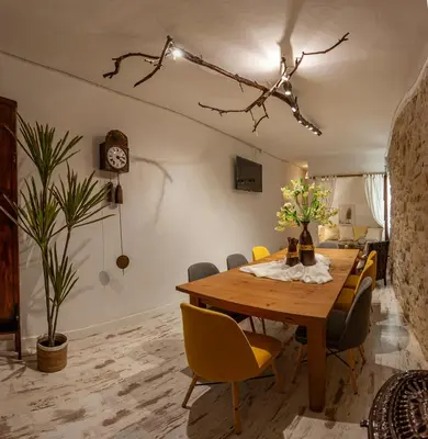 Una televisión o centro de entretenimiento en Casa Boutique Kimeta