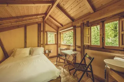 Cama o camas de una habitación en Beigorri Basoa Suites