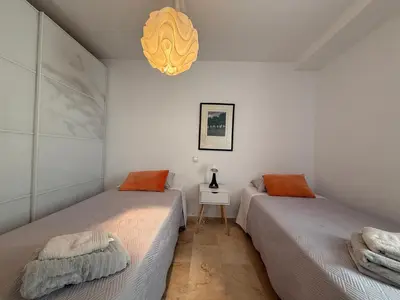 Cama o camas de una habitación en 18 Torres Santa Cruz