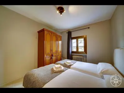 Cama o camas de una habitación en CASA BARLONGUETA de Alma de Nieve