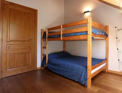 Cama o camas de una habitación en Precioso ático Esterri Aneu