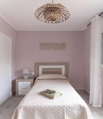 Cama o camas de una habitación en Vivienda Rural Casa del Medico