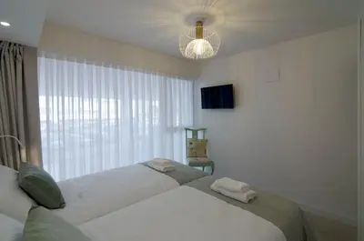 Cama o camas de una habitación en Marhaba Cozy Home