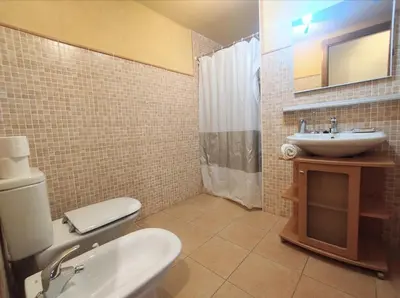 Un baño de CHECK-IN CASAS La casa de Conques
