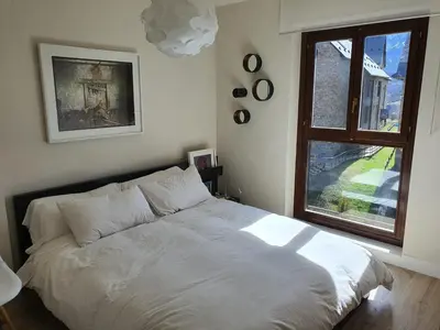 Cama o camas de una habitación en Luminoso y moderno dúplex familiar