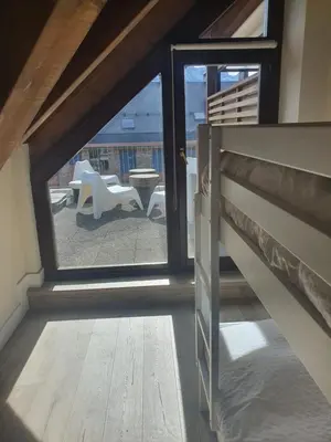 Cama o camas de una habitación en Luminoso y moderno dúplex familiar