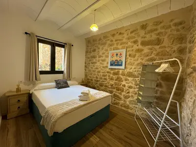 Cama o camas de una habitación en Casa Don Pelayo Boutique Apartments & Café
