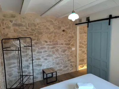 Cama o camas de una habitación en Casa Don Pelayo Boutique Apartments & Café