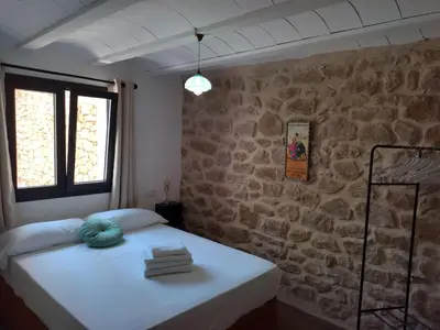 Cama o camas de una habitación en Casa Don Pelayo Boutique Apartments & Café