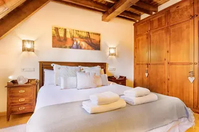 Cama o camas de una habitación en Casa val de Unhola