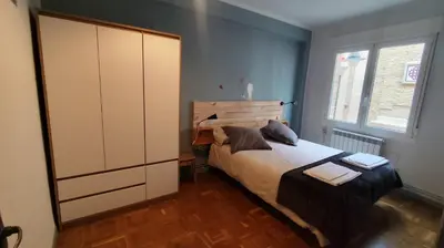 Cama o camas de una habitación en Dormitalería