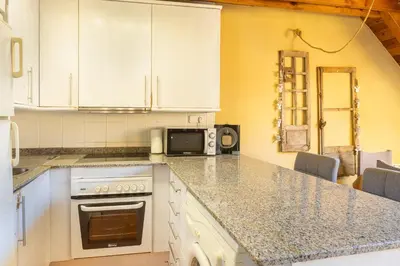 Una cocina o zona de cocina en V1 eraclau - Eth Artigarix con parking en VILAC