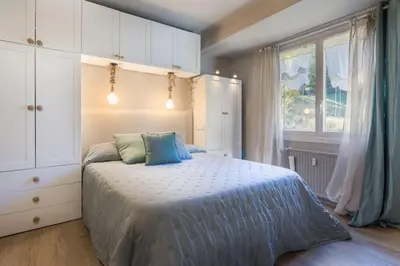 Cama o camas de una habitación en S1 eraclau - Eth Balear con garage SAPPORO VIELHA