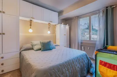 Cama o camas de una habitación en S1 eraclau - Eth Balear con garage SAPPORO VIELHA