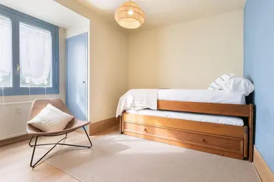 Cama o camas de una habitación en S3 eraclau - Era Llum con garage en SAPPORO VIELHA