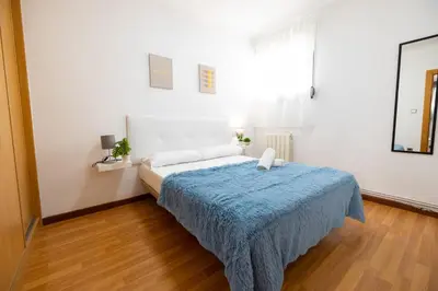 Cama o camas de una habitación en Ofrenda del Pilar Turistea