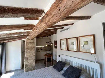Cama o camas de una habitación en Ático con terraza en Capçanes