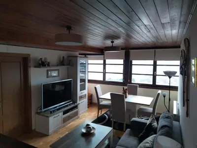 Una televisión o centro de entretenimiento en Ibón de Estanés Apartamento en Formigal