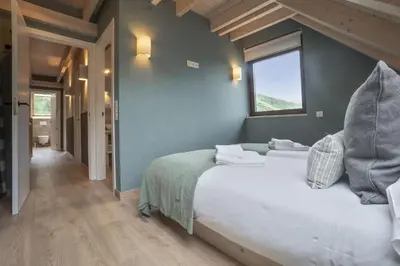 Cama o camas de una habitación en Luderna - Tríplex Amitges
