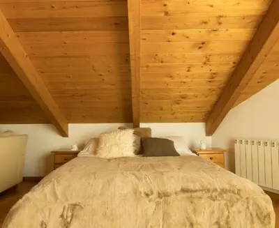 Cama o camas de una habitación en Villa Hoz de Jaca