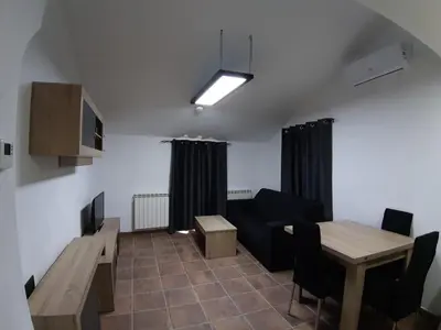 Una televisión o centro de entretenimiento en Caxa Xavier - Apartamento 3