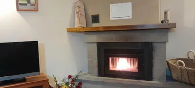 Una televisión o centro de entretenimiento en La Bordeta Serena - Casa Toño
