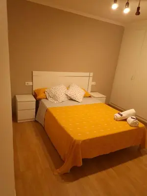 Cama o camas de una habitación en Apartamento El Cortijo