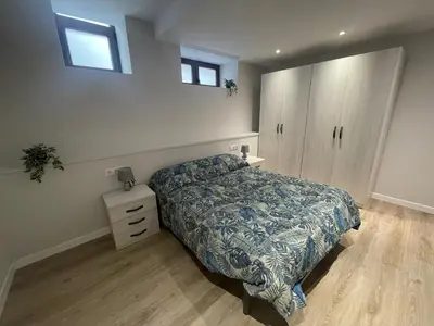 Cama o camas de una habitación en Amama Etxea