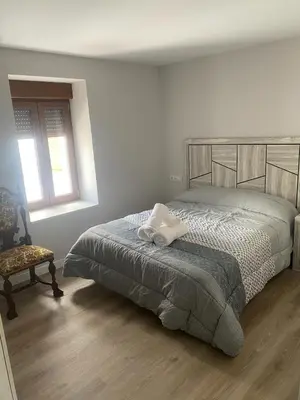Cama o camas de una habitación en Amama Etxea