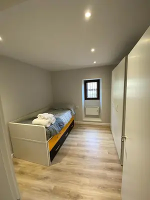 Cama o camas de una habitación en Amama Etxea