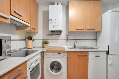 Una cocina o zona de cocina en Cochata, práctico y céntrico - Arafita Apartamentos