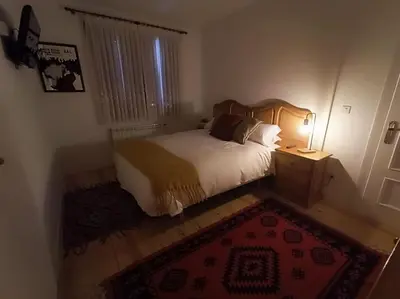 Cama o camas de una habitación en Balaitus Petfriendly - Arafita Apartamentos