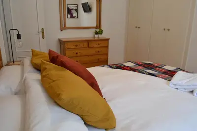 Cama o camas de una habitación en Balaitus Petfriendly - Arafita Apartamentos