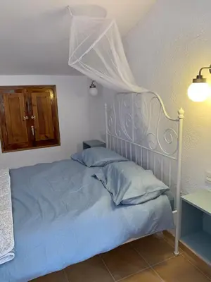Cama o camas de una habitación en Casa Solans - Casa Rural