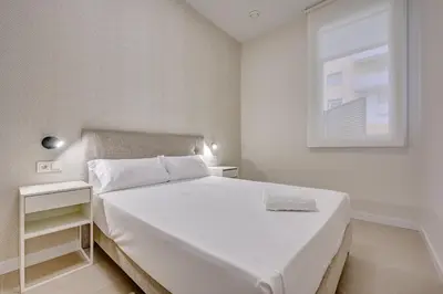 Cama o camas de una habitación en Apartamentos Panda by Clabao
