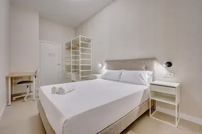 Cama o camas de una habitación en Apartamentos Panda by Clabao