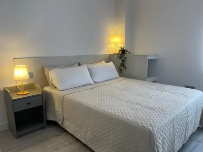 Cama o camas de una habitación en Voix du Monde