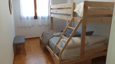 Cama o camas de una habitación en Apartamento Loira Villanúa