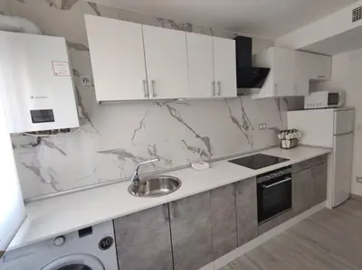 Una cocina o zona de cocina en Apartamento con Jacuzzi: El Rincón de las Delicias