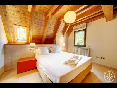 Cama o camas de una habitación en CASA ARROQUETS de Alma de Nieve