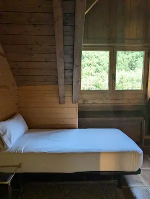 Cama o camas de una habitación en SNÖ Apartamentos Escarrilla