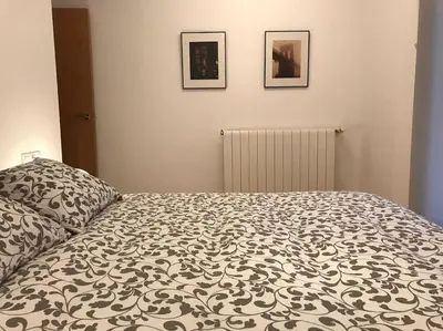 Cama o camas de una habitación en Apartamento la Abadía en Tramacastilla
