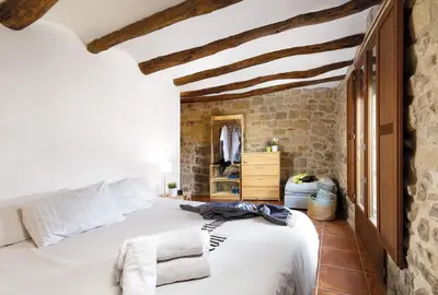 Cama o camas de una habitación en Chimenea y vistas espectaculares a los Puertos