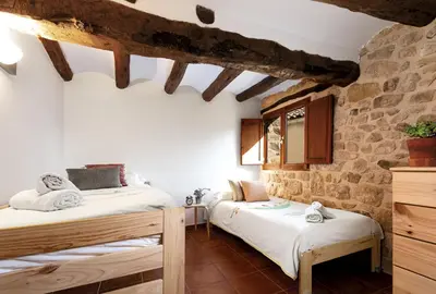 Cama o camas de una habitación en Chimenea y vistas espectaculares a los Puertos