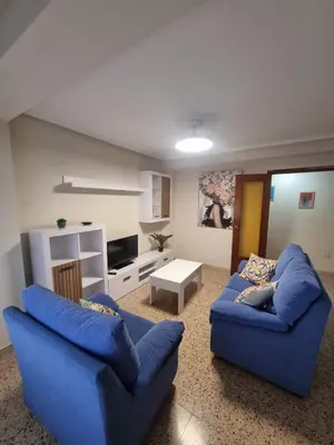 Una televisión o centro de entretenimiento en Amani Apartamento Alcañiz