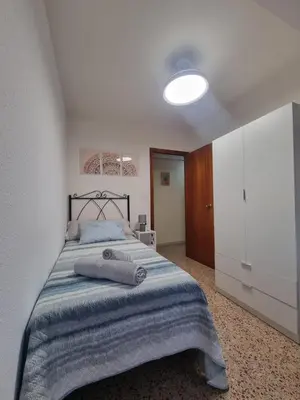 Cama o camas de una habitación en Amani Apartamento Alcañiz